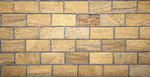 石灰石墙纹理外壳墙 环保的建筑材料 — 图库照片