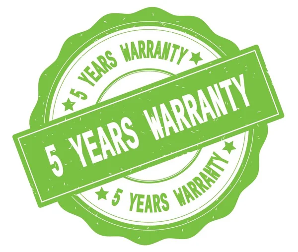 5 YEARS WARRANTY text, written on green round badge. — Stock Photo, Image