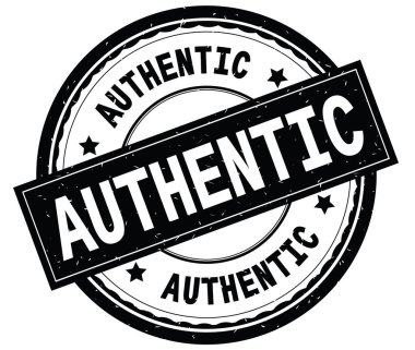 Orijinal metin siyah yuvarlak lastik damga yazılmış.