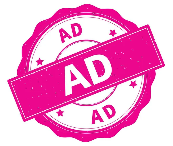 AD text, skriven på rosa runda badge. — Stockfoto