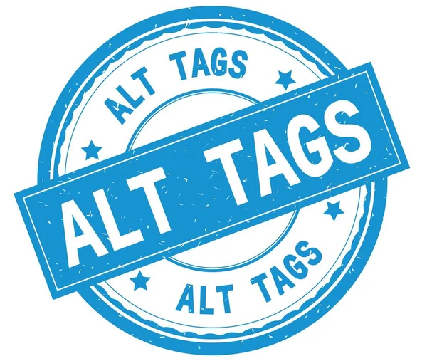 ALT TAGS, texto escrito sobre sello de goma redonda cian . —  Fotos de Stock