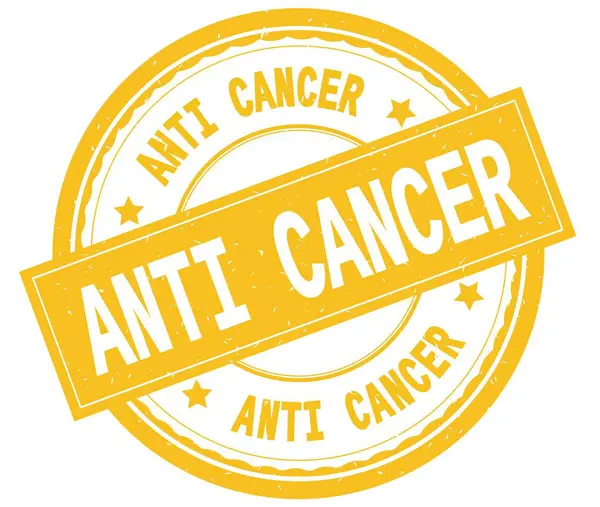 ANTI CANCER, skriftlig tekst på gul rund gummistempel . - Stock-foto