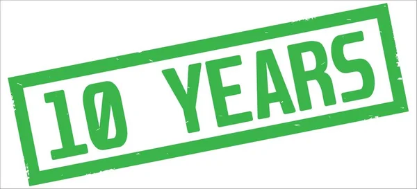 10 YEARS text, on green rectangle border stamp. — 스톡 사진