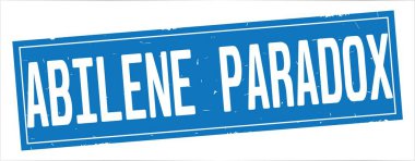 Abilene Paradox metni, tam mavi dikdörtgen damgası.