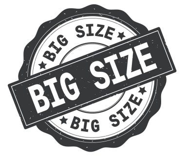 Gri yuvarlak rozet yazılı büyük boyut metin.