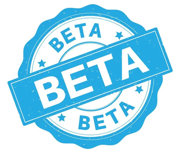 Texto BETA, escrito em ciano crachá redondo . — Fotografia de Stock