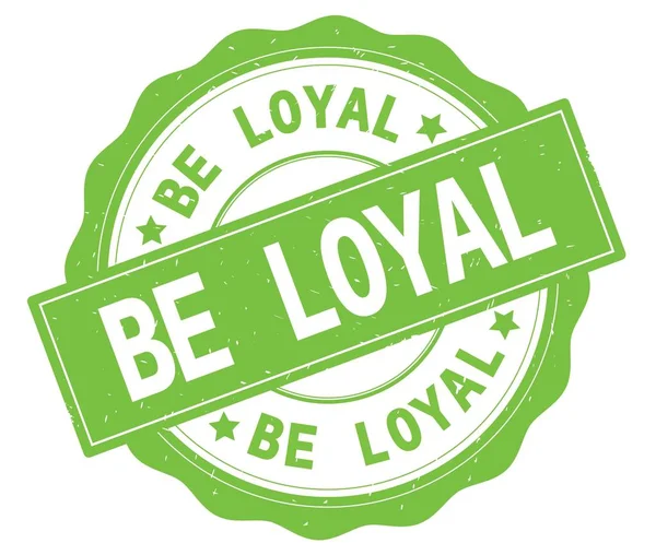 Loyaler Text, geschrieben auf grüne runde Plakette. — Stockfoto
