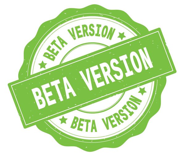 Текст BETA VERSION, написанный на зеленом круглом значке
.