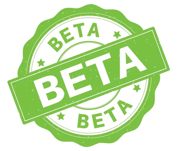 Texto BETA, escrito em crachá redondo verde . — Fotografia de Stock