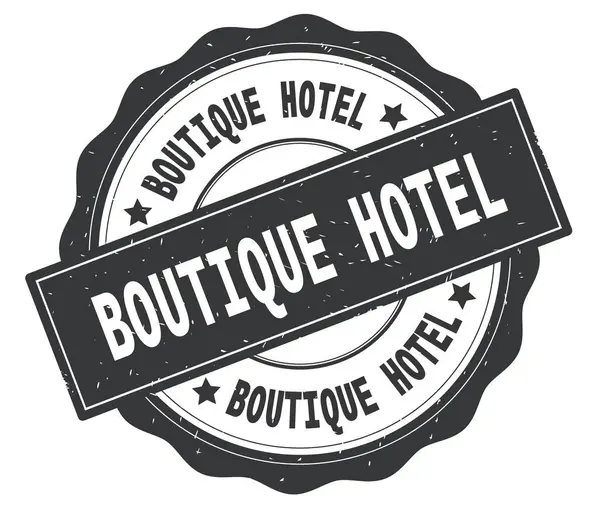 BOUTIQUE HOTEL texte, écrit sur écusson rond gris . — Photo