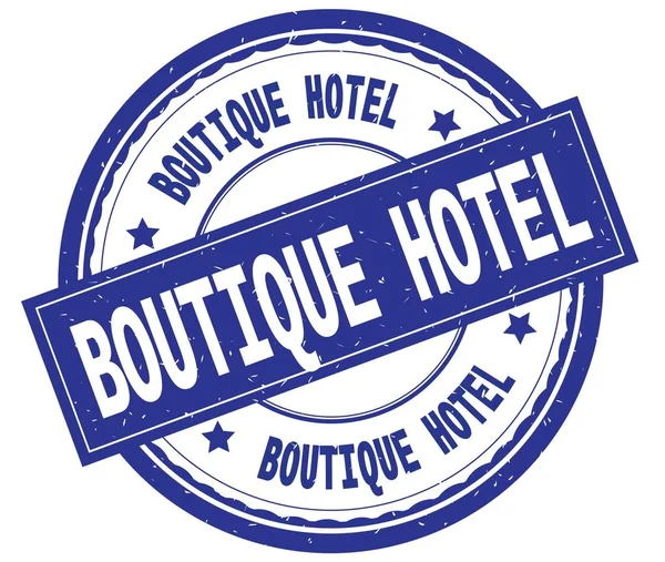 Boutique-Hotel, geschriebener Text auf blauem runden Gummistempel. — Stockfoto