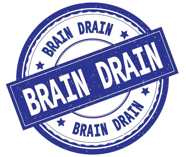 BRAIN DRAIN, written text on blue round rubber stamp . — стоковое фото