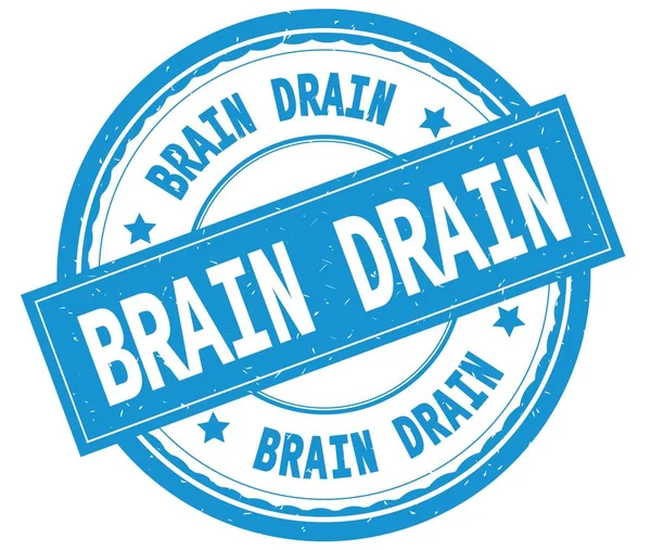 BRAIN DRAIN, written text on cyan round rubber stamp . — стоковое фото
