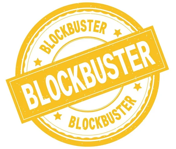Blockbuster, skriven text på gula runda gummistämpel. — Stockfoto