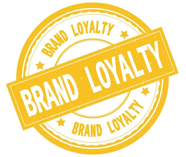 BRAND LOYALTY , written text on yellow round rubber stamp. — Stock Photo, Image