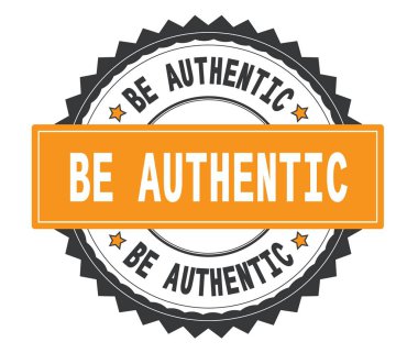 Üzerinde gri ve turuncu yuvarlak damga, zig zag b ile otantik metin olarak