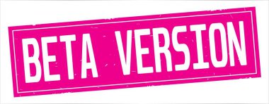 Tam pembe dikdörtgen damga üzerinde beta sürümü metin.