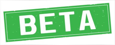 Tam yeşil dikdörtgen damga üzerinde beta metin.