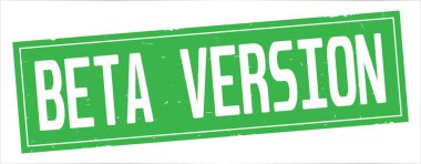 Tam yeşil dikdörtgen damga üzerinde beta sürümü metin.