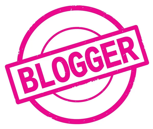 Blogger tekst, geschreven op roze eenvoudige cirkel stempel. — Stockfoto