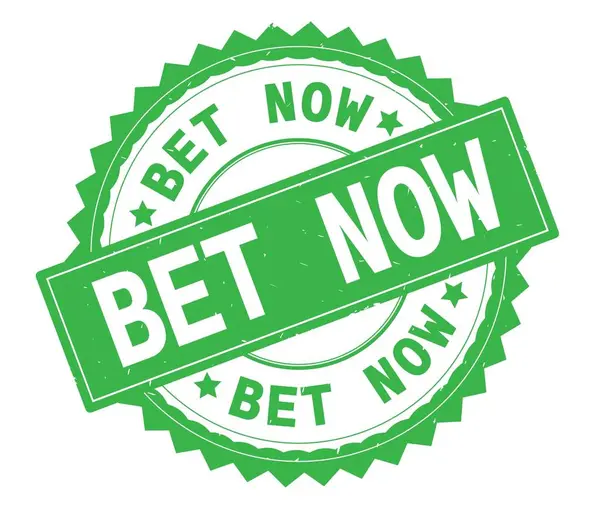 BET NOW green text round stamp, with zig zag border. — Stock Photo, Image