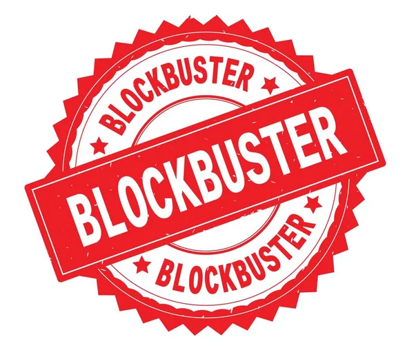 Blockbuster rode tekst ronde stempel, met zig zag rand. — Stockfoto