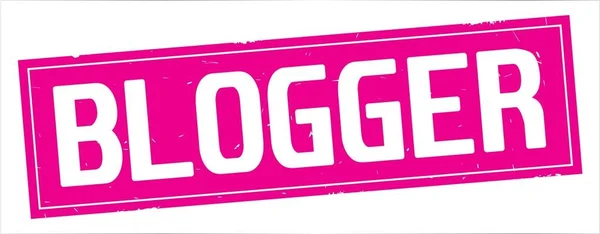 BLOGGGER text, on full pink rectangle stamp . — стоковое фото
