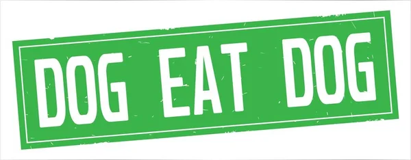 DOG EAT DOG text, on full green rectangle stamp. — Stock Photo, Image
