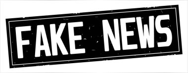 Tam siyah dikdörtgen damga üzerinde sahte haber metni.