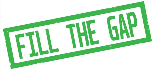 FILL THE GAP text, on green rectangle border stamp.