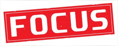 Tam kırmızı dikdörtgen damga üzerinde odak metin.