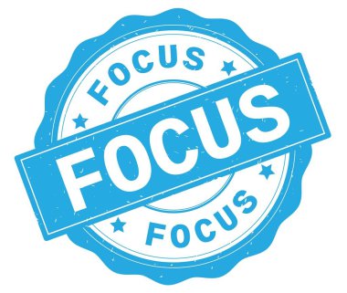 Odağı metin, camgöbeği yuvarlak rozet yazılmış.