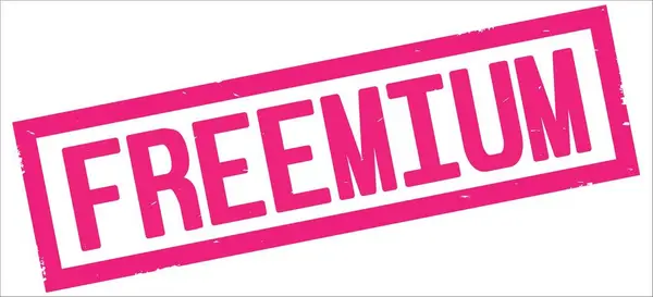 Freemium text, na růžový obdélník hranice razítka. — Stock fotografie