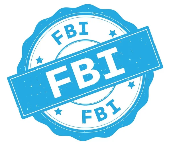 FBI text, napsaný na azurové kolo odznaku. — Stock fotografie