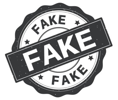 Gri yuvarlak rozet yazılmış sahte metni.