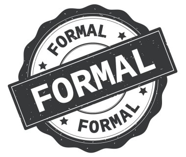 Gri yuvarlak rozet yazılı resmi metin.