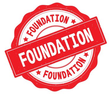 Kırmızı yuvarlak rozet yazılmış Vakfı metni,.