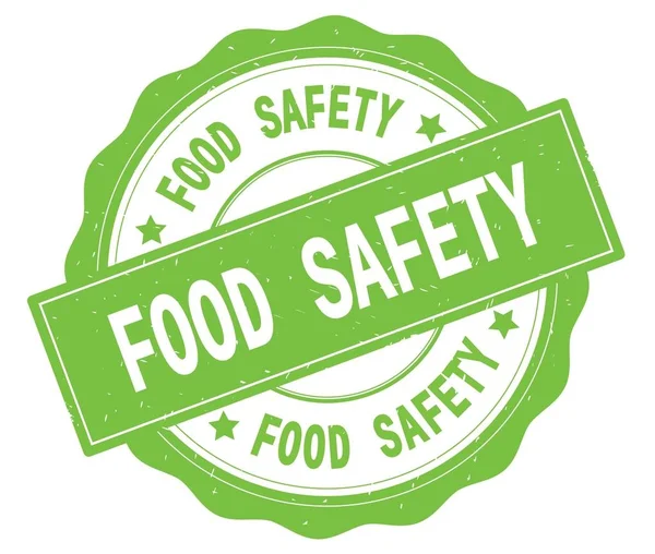 FOOD SAFETY text, written on green round badge. — Stock Photo, Image