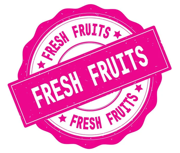 Text mit frischen Früchten, geschrieben auf rosa rundem Abzeichen. — Stockfoto