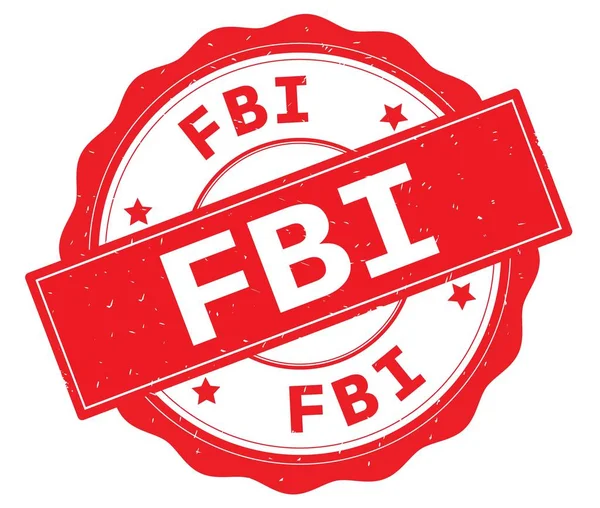FBI text, napsaný na červené kulaté odznak. — Stock fotografie