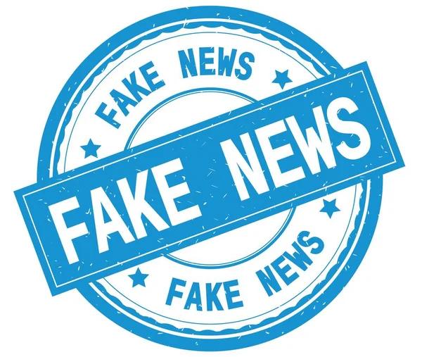 Fake News, schriftlicher Text auf zyanischem runden Gummistempel. — Stockfoto