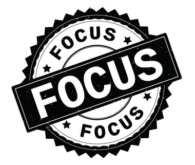 Odak siyah metin damgası, zig zag kenarlıklı yuvarlak.