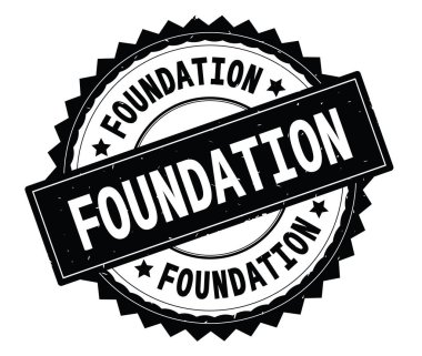 Vakfı siyah metin damgası, zig zag kenarlıklı yuvarlak.