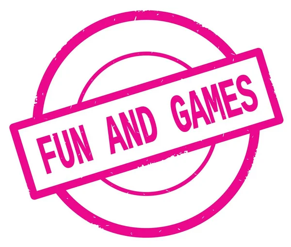 Zabawy i gry tekst, napisany na koło proste różowy stempel. — Zdjęcie stockowe