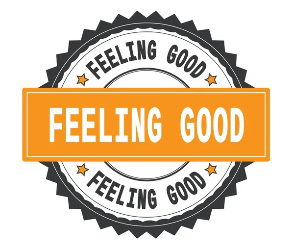 FEELING GOOD text on grey and orange round stamp, with zig zag b — Stock Photo, Image