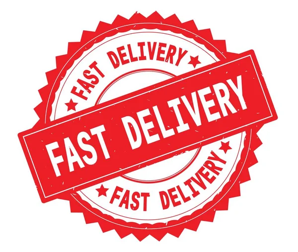 FAST DELIVERY red text round stamp, with zig zag border. — Stock Photo, Image