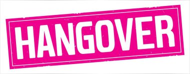 Tam pembe dikdörtgen damga üzerinde kalıntı metin.