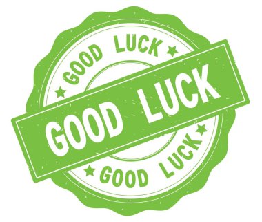 Yeşil yuvarlak rozet yazılmış iyi şanslar metni.