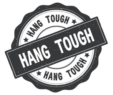 Gri yuvarlak rozet yazılı zor metin asmak.