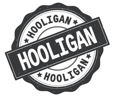 Holigan metin, gri yuvarlak rozet yazılmış.